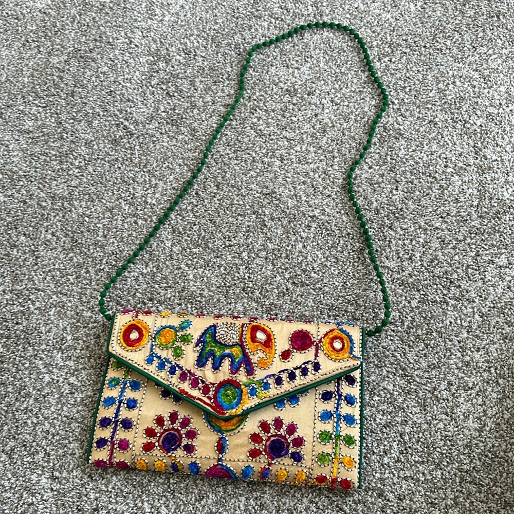 Elephant embroidered clutch